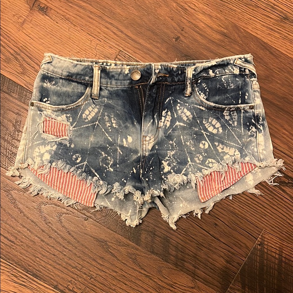 Distressed Denim Shorts with Red Accents